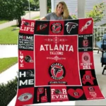Atlanta Falcons Quilt Blanket on a bed